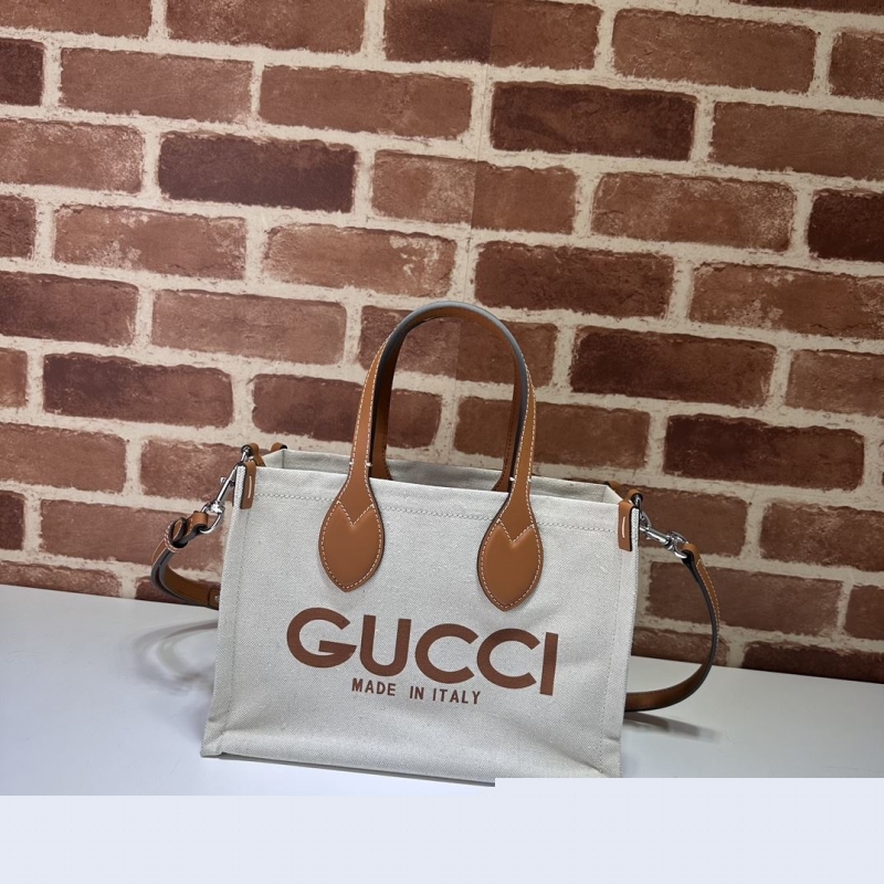 G*u*i top handle bags